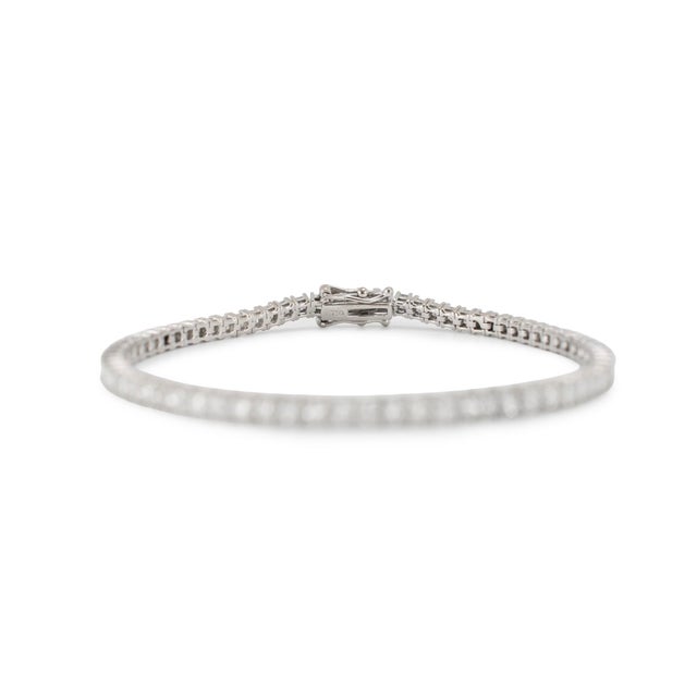 Gender: Ladies Metal Type: 18K White Gold Length: 7.25 inches Width: 3.20 mm Weight: 10.34 grams Ladies 18K white gold,...