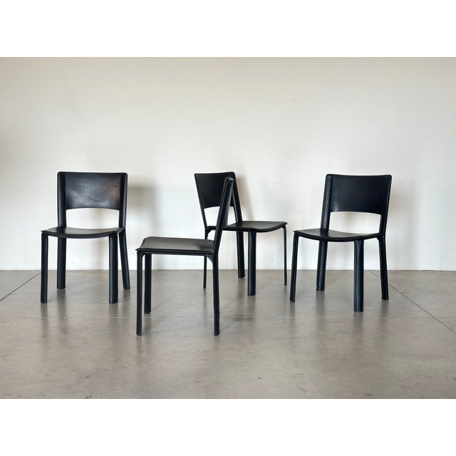 Set of 4 black leather chairs produced by Cidue in the 70s This piece has an attribution mark, I am sure that it is...
