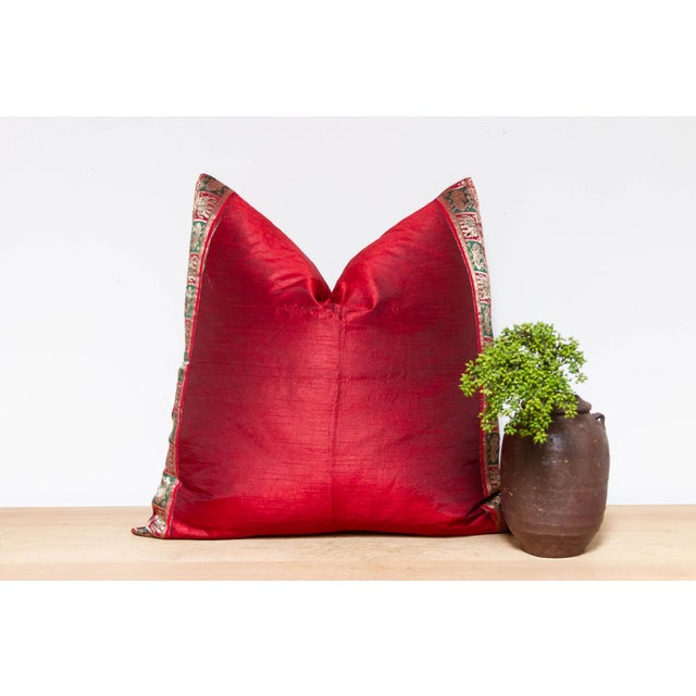 This brilliant silk euro pillow is a luxurious addition to any living room. Made out of silk with intricate borders of...