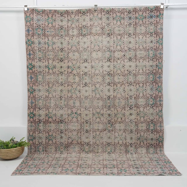Vintage Hand-Knotted area rug is a semi-antique vintage area rug. The '70s Eastern region of Anatolian's unique rug is...