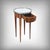 This small louis xvi style side table, made in the early 20th century, is distinguished by the elegance of its silhouette...