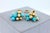 Blue Blue Turquoise Diamonds Golden Sphere Bells Motif Two Tone Gold Huggie Earrings, A Pair For Sale - Image 8 of 14