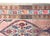 This antique Persian Serab runner, dating to the early 20th century, features a classic camel-colored field adorned with a...