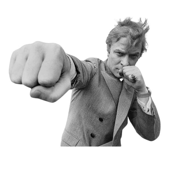 English actor Michael Caine, throwing a punch, August 1965. (Keystone Features/Hulton Archive/Getty Images) As an...