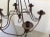 Metal Vintage Rusty Candle Chandelier For Sale - Image 7 of 10