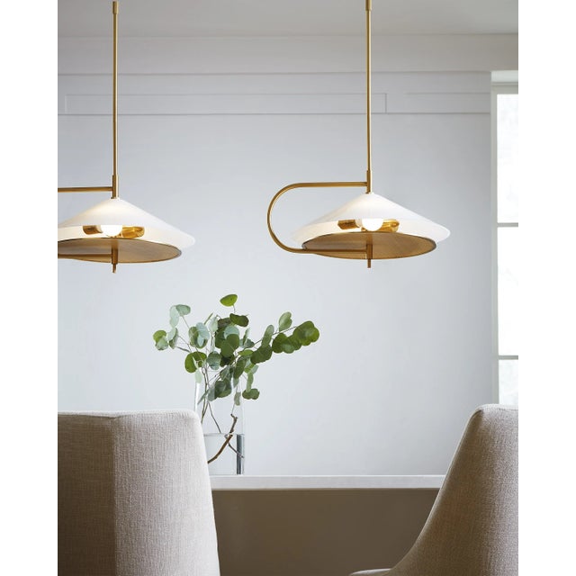 The Gesture two light indoor pendant by Kelly Wearstler offers a dramatic and architectural take on Kelly’s signature use...