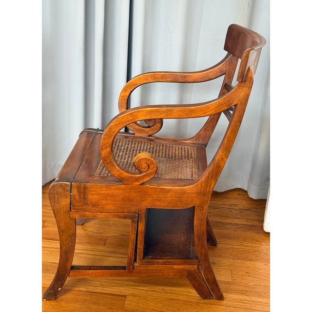From Theodore Alexander of England, late 1900s, Hand Made Regency metamorphic chair that converts to steps. Solid mahogany...