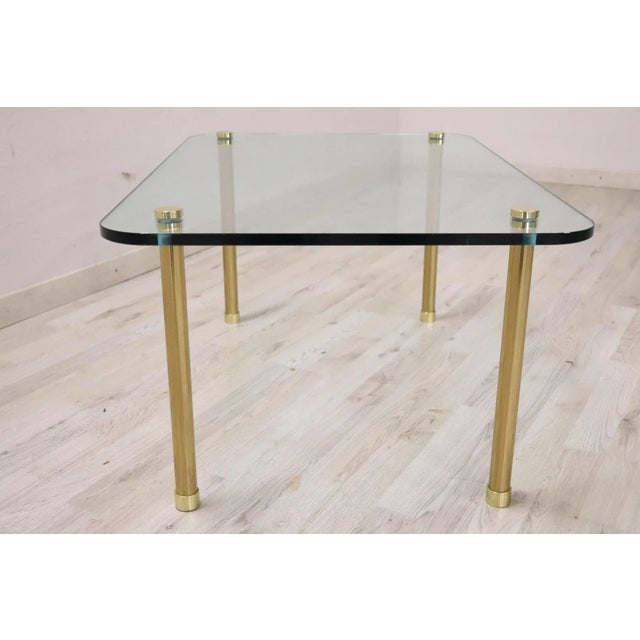 Rare Italian coffee table, 1980s, in rare refined crystal with legs in gilded brass. Used, good vintage condition.