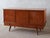 This sideboard is a rare 1960s design by French designer Gaston Poisson. Crafted in teak, it bears the master's signature:...