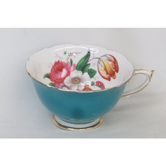 This stunning Paragon fine bone china coffee cup / tea cup was produced in the 1940s. The inside of the cup features a...