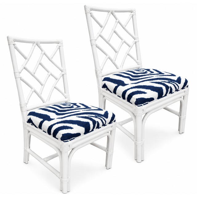 Bring timeless Palm Beach elegance to your home with this beautiful pair of vintage Chippendale bamboo side chairs....