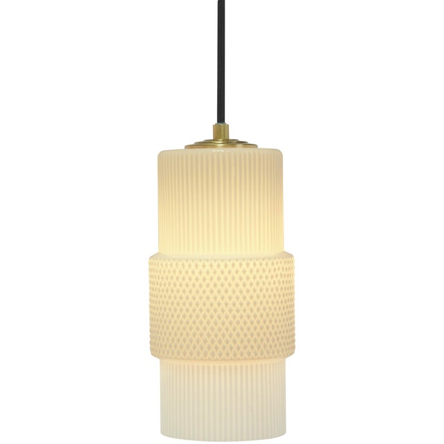 Hand-blown in Venice, Italy, the Mimo Cylinder Pendant Light by Oggetti features a clean, architectural silhouette that...