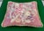 Hand-stitched needlepoint of a dense, traditional floral bouquet pattern with colors such as mauve, pink, cream, green,...