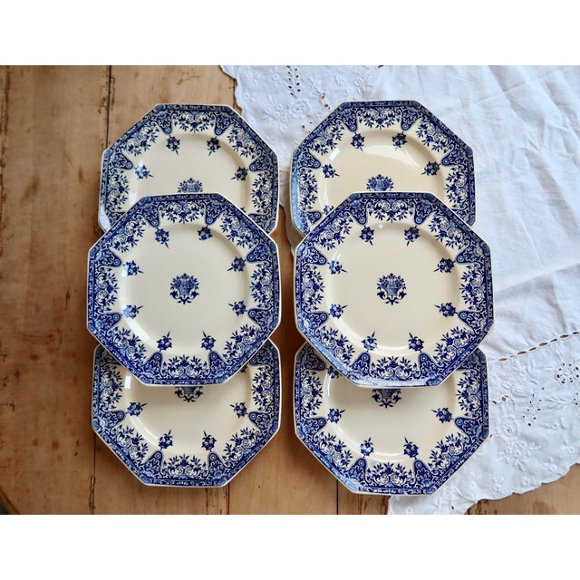 Exceptional set of six Longchamp ironstone dinner plates, Rouen pattern, made in the late 19th century. The refined blue...