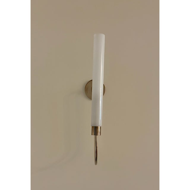 The Urban Electric Company Spindle Sconce (Regular Size) is a slender, exceptionally graceful lighting fixture bench-...