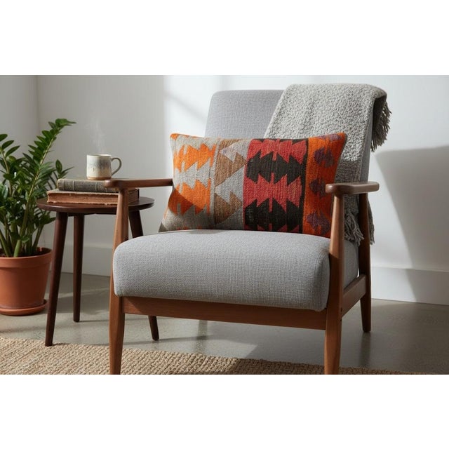Add a touch of history and warmth to your space with this vintage handmade Turkish wool kilim cushion cover. Crafted from...
