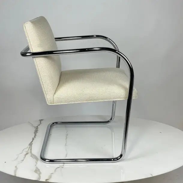 Knoll Brno chair designed by Mies Van der Rohe. These chairs are upholstered in Knoll's Cato upholstery. Color is...