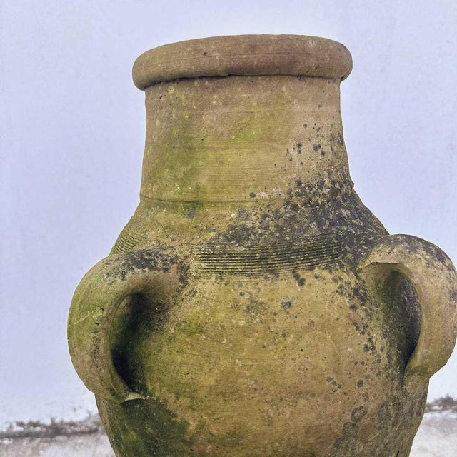 Vintage terracotta vase Height: 62 Width: 31 Depth: 31 Diameter: 11.5. This piece is attributed to the mentioned...