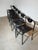 Iconic set of six black ‘Spaghetti’ chairs designed by Giandomenico Belotti . These sculptural dining chairs feature a...