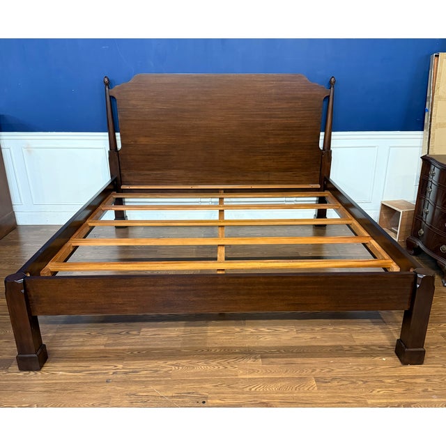 This is a Traditional King Size Mahogany Low Post by Leighton Hall. It features a classic cathedral mahogany headboard...