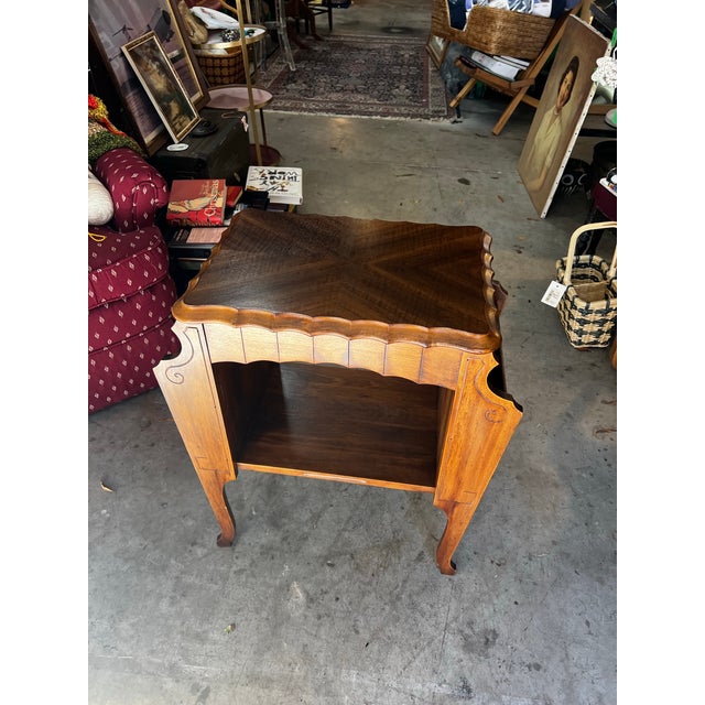 Up for consideration is a beautiful vintage wooden MCM side table with shelf storage. This would look lovely in your home,...
