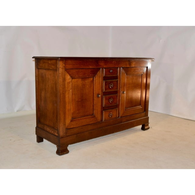 19th century oak buffet from France with a banded and beveled edge around the top, following down to simple paneled sides...