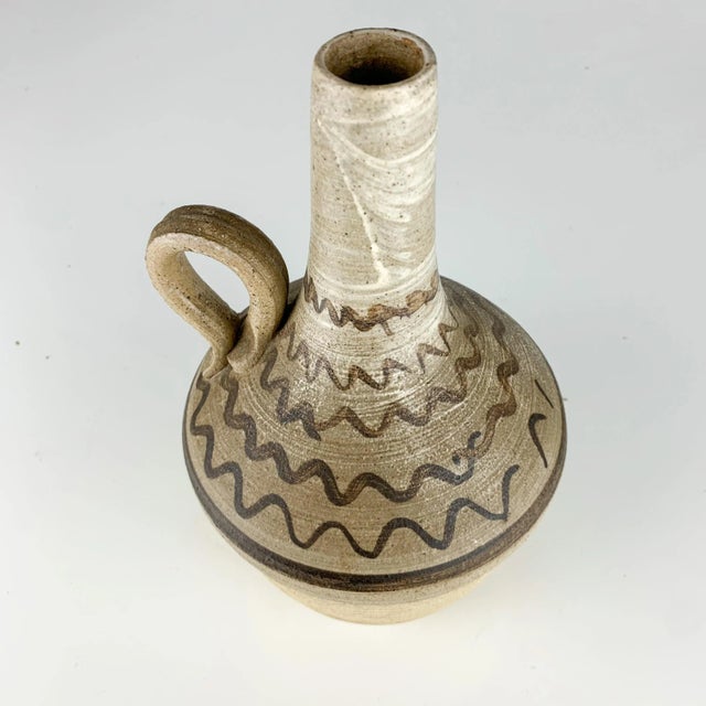 Lovely handmade vintage studio pottery jar/vase with handle. Great folk art - southwest look. Love the glaze and painting...