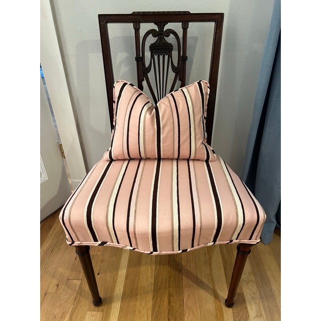 This chair was expertly crafted most probably in the early 1900’s in the Federal or Sheraton style. It could also be...