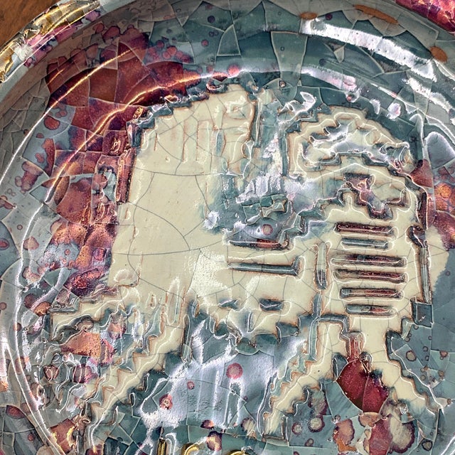 This Sardinian polychrome ceramic bowl was designed by Claudio Pulli for Isola. It features multicolored crackle nail...