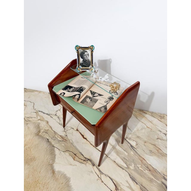 We are pleased to offer for sale an elegant pair of Mid-Century Modern Italian bedside tables, crafted in Italy circa...