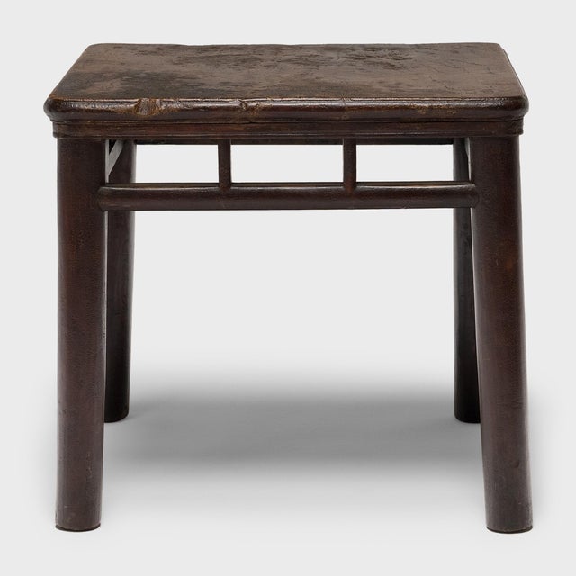 This square side table dates to the mid-19th century, crafted of elmwood (yumu) using mortise-and-tenon joinery with...