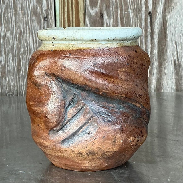 This Vintage Boho Original Studio Pottery Vase is a stunning example of handcrafted artistry, offering a unique blend of...