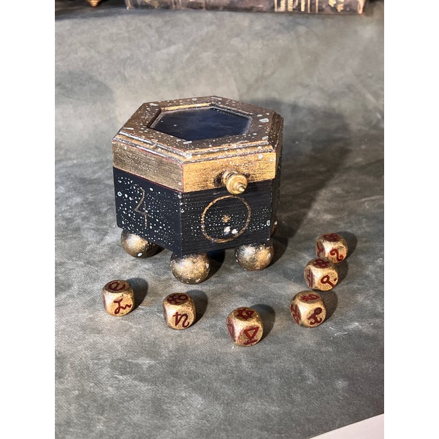 This beautiful, custom-crafted set is an occult divination and astrological dice set paired with a matching hand-painted...