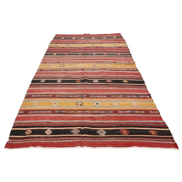 Vintage handwoven decorative kilim rug from Denizli region of Turkey. Approximately 50-60 years old. In very good condition.