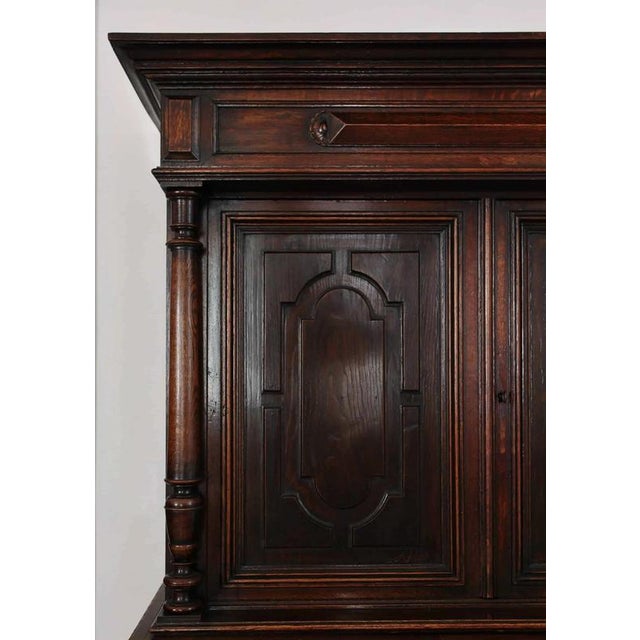 Solid oak decorated with carvings and turnings. Sturdy design in very good quality - everything is made of solid wood,...