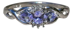 The Ninebark: Ladies Simple White Gold Cocktail Ring set with 0.60 CTW Tanzanite and Diamonds
