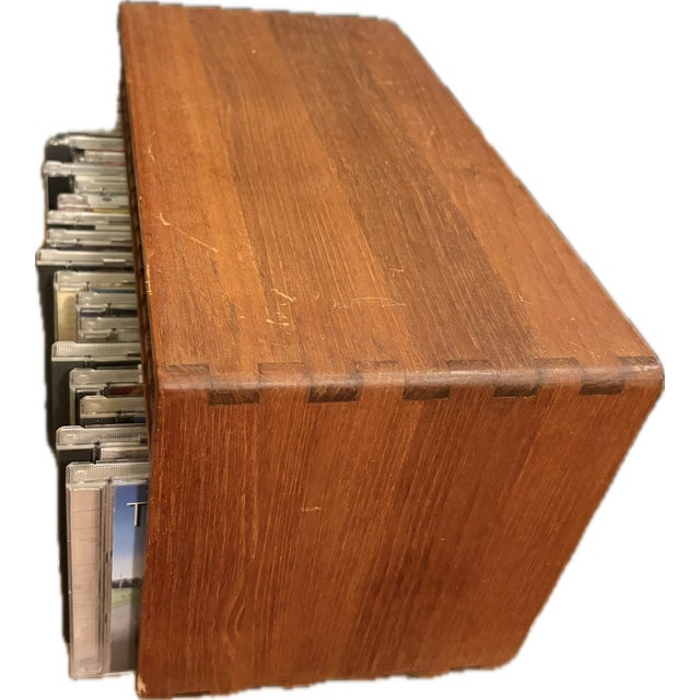 A stunning vintage media storage rack by the renowned Kalmar Designs. Crafted from rich, honey-toned solid teak wood, this...