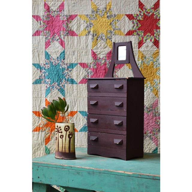 Antique Folk Art Miniature Chest of Drawers with Diminutive Mirror, Circa Early 20th Century. Minimal in design with four...