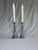 This pair of vintage candlesticks feature a striking barley twist stem that mimics a classic-open-helix design. The silver...