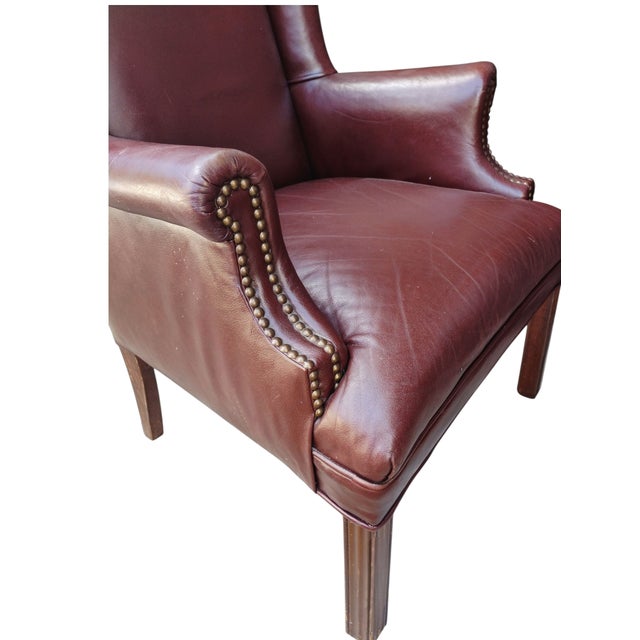 Introducing the classic wingback leather chair, a masterpiece of comfort and craftsmanship from Kenyon Furnishings of High...