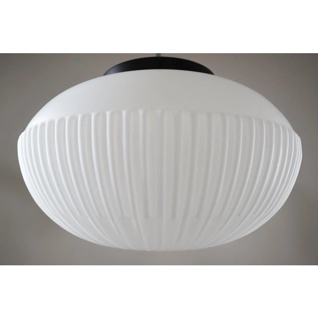 Large set of pendants, opaline glass, europe, 1960s. The diffuse light it spreads is very atmospheric. Completed with the...