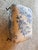Charming vintage foot rest featuring decorative black wrought iron scrollwork and classic blue-and-white toile upholstery....