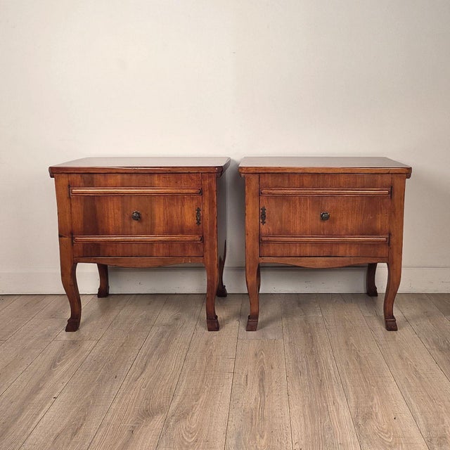 A pair of Italian cherry nightstands incorporating antique elements, supplied by Antonio's, S.F.
