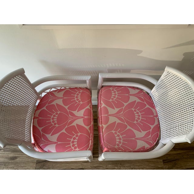 Vintage White Bamboo Swivel Chairs With Floral Pink Seat Cushions a