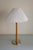 Swedish Mid-Century Table lamp with new leather wrapped around the lamp arm and a metal, possibly nickel plated, lampfot....