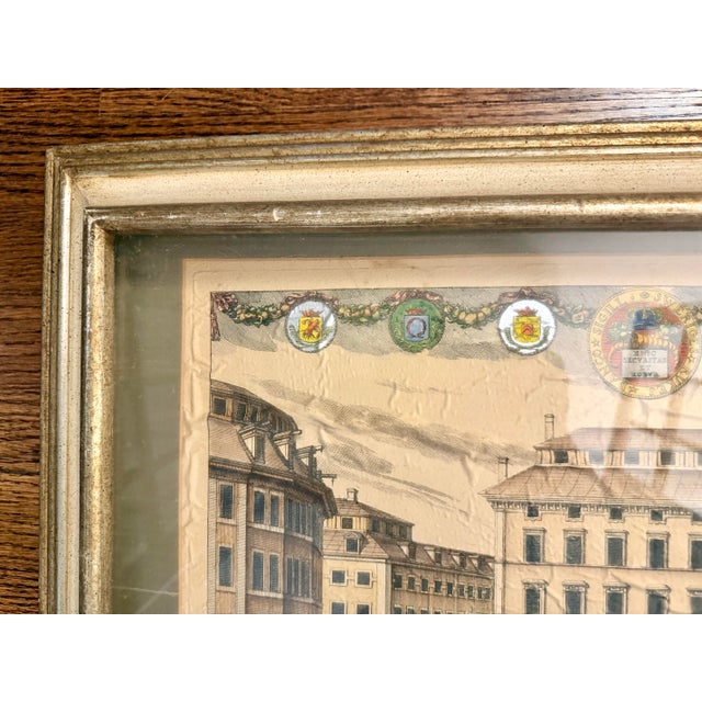 Deep, solid wood gilded frame, possibly newer than the 1705 copperplate engraving. This print depicts the Södra Bancohuset...