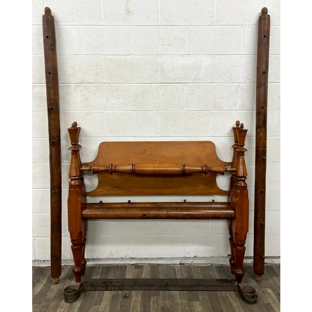 This is a stunning and rare antique rope poster bed that can accommodate a twin or 3/4 size mattress. It features...