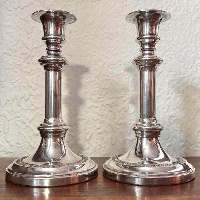Brilliant pair of late 20th century silver plated candlesticks, Italian in origin. Made by Waterford with faded marks on...