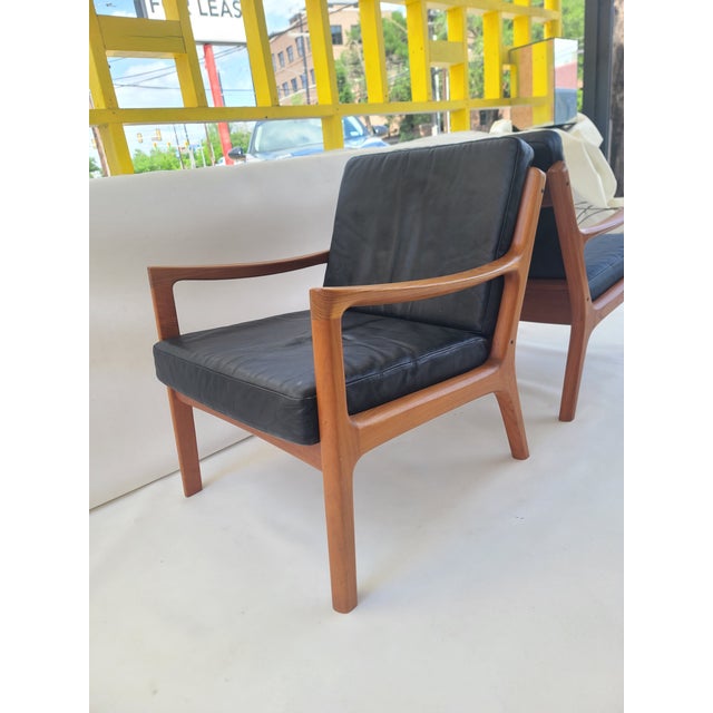 Pair of solid Teak 1960s Senator Lounge Chairs designed by Ole Wanscher for France & Son Denmark. Original Teak and...