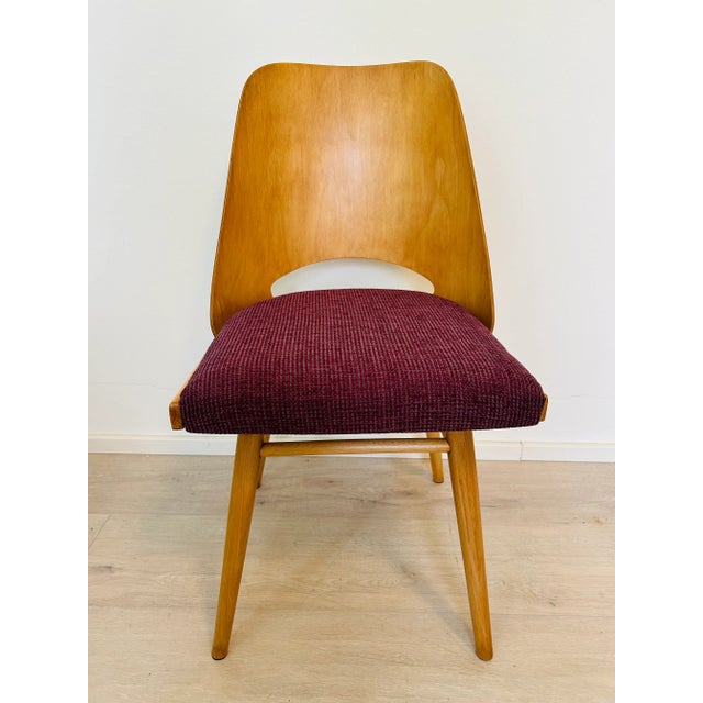 This vintage chair by famous furniture designer Radomir Hofman have been carefully restored and upholstered in our family...